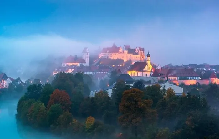Framed Print : Fussen, Germany old town on the Lech River during a foggy twilight Framed Print : Fussen, Germany old town on the Lech River during a foggy twilight
