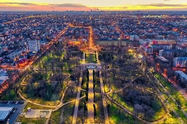 Galati, Romania - February 28, 2021: Aerial view of Galati City, Romania, at sunset with city lights on