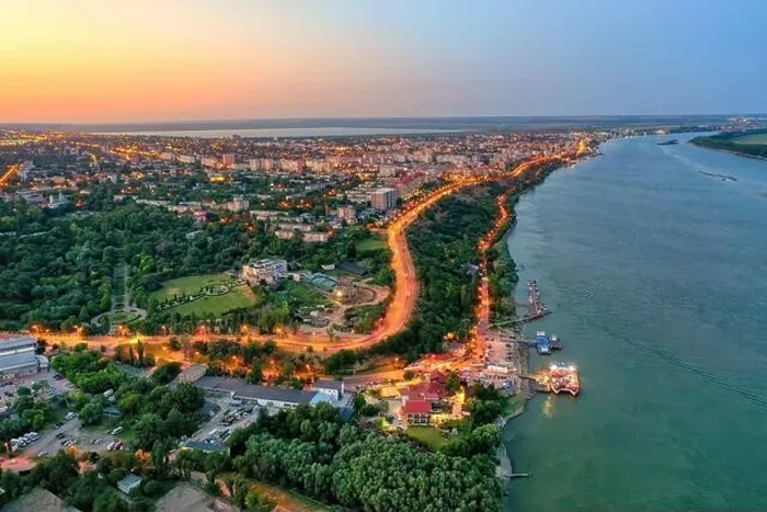 Framed Print : Galati, ROMANIA - July 22, 2021: Aerial view of Galati City, Romania. Night city lights after sunset at blue hour Framed Print : Galati, ROMANIA - July 22, 2021: Aerial view of Galati City, Romania. Night city lights after sunset at blue hour