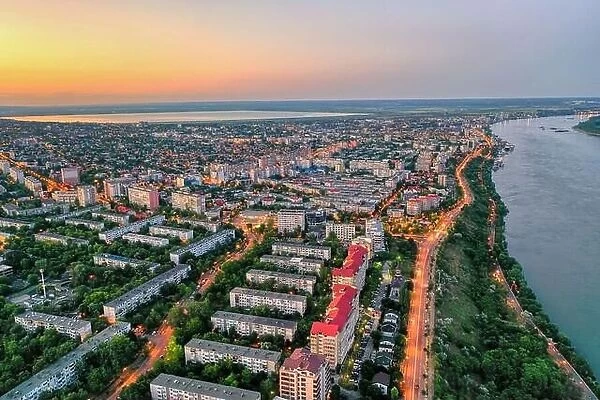 Galati, ROMANIA - May 26, 2022: Aerial view of Galati City, Romania. Night city lights after sunset at blue hour