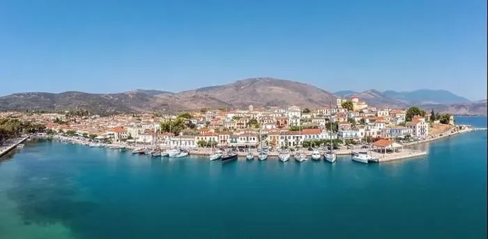 Framed Print : Galaxidi Greece from above, aerial drone view, sunny day. Traditional waterfront houses and boats, blue sky and sea