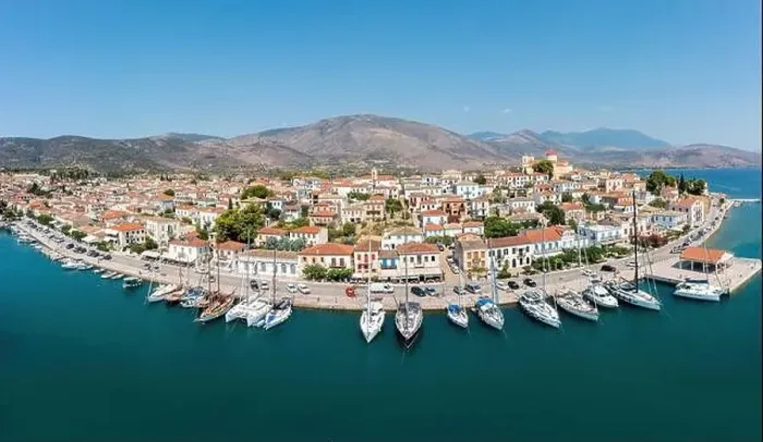 Framed Print : Galaxidi Greece from above, aerial drone view, sunny day. Traditional waterfront houses and boats, blue sky and sea Framed Print : Galaxidi Greece from above, aerial drone view, sunny day. Traditional waterfront houses and boats, blue sky and sea