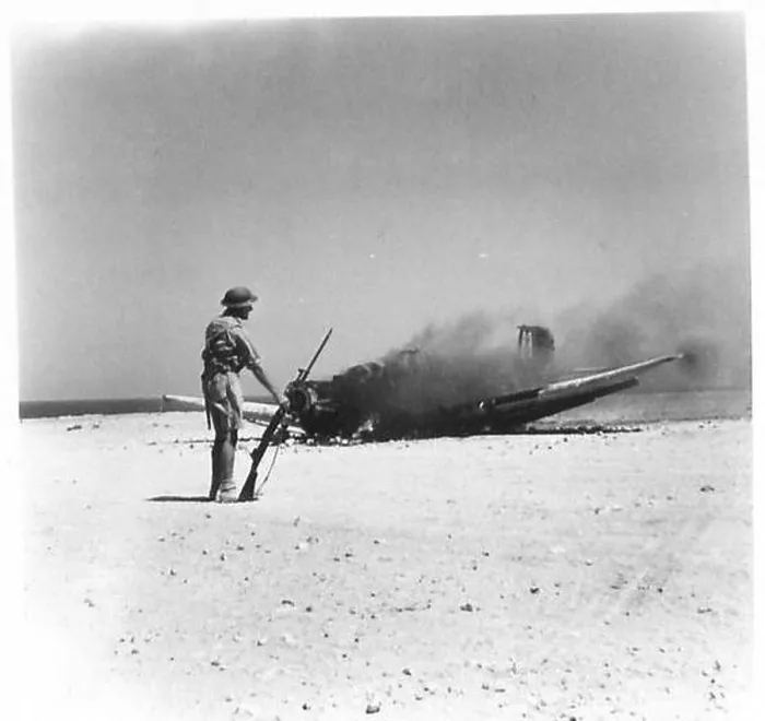 Framed Print : A German bomber is destroyed after being struck by anti-aircraft gunfire at Tobruk