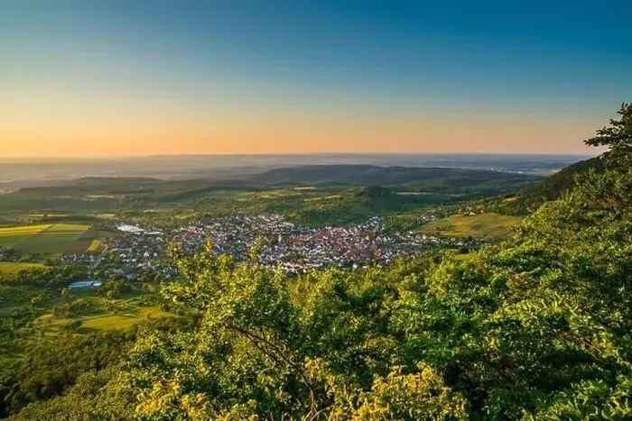 Framed Print : Germany, Panorama view above green landscape of beuren city houses and mountains of swabian jura scenery Framed Print : Germany, Panorama view above green landscape of beuren city houses and mountains of swabian jura scenery