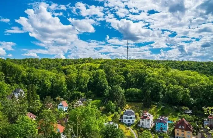 Framed Print : Germany, Stuttgart television tower building surrounded by green trees of forest on sunny day Framed Print : Germany, Stuttgart television tower building surrounded by green trees of forest on sunny day