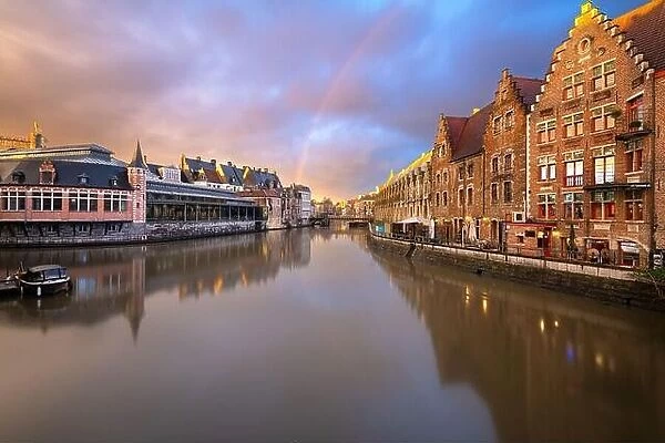 Ghent, Belgium old town cityscape on the Leie River at twilight