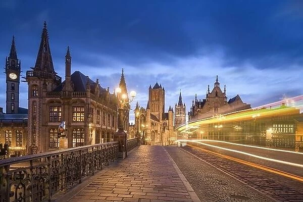 Ghent, Belgium old town cityscape from St. Michael's Bridge at dawn