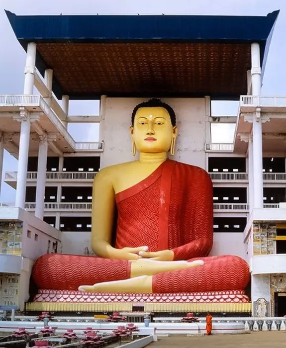 Framed Print : Giant Buddha statue at the Weherahena Temple, monk standing at front, Matara, Matara Distrikt, Südprovinz, Sri Lanka Framed Print : Giant Buddha statue at the Weherahena Temple, monk standing at front, Matara, Matara Distrikt, Südprovinz, Sri Lanka