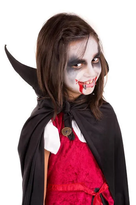 Framed Print : Girl with face-paint and Halloween vampire costume isolated in white Framed Print : Girl with face-paint and Halloween vampire costume isolated in white