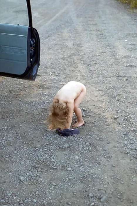 Framed Print : Girl peeing in the road Framed Print : Girl peeing in the road
