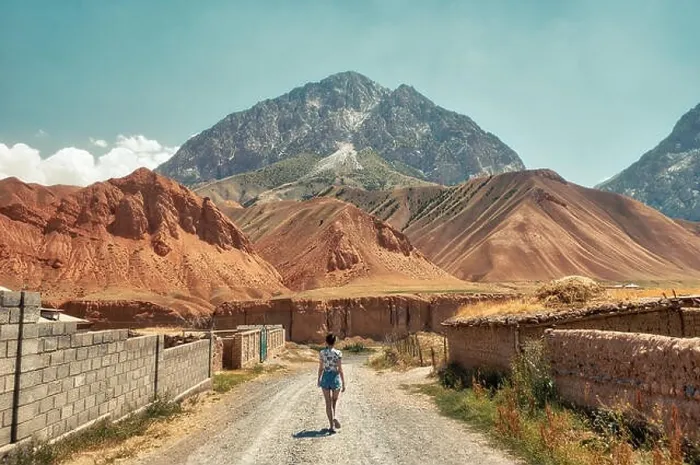 Framed Print : Girl in front of Taldyk Mountain Pass in Kyrgyzstan taken in August 2018 Framed Print : Girl in front of Taldyk Mountain Pass in Kyrgyzstan taken in August 2018