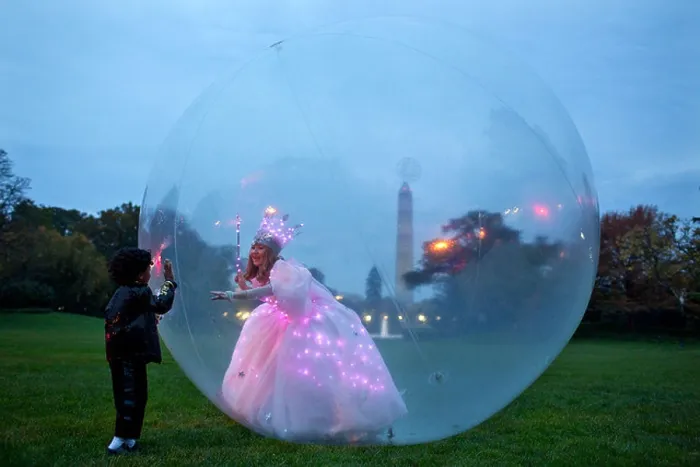 Framed Print : Glinda the Good Witch greets children from inside her bubble during Halloween on the South Lawn of the White House Framed Print : Glinda the Good Witch greets children from inside her bubble during Halloween on the South Lawn of the White House