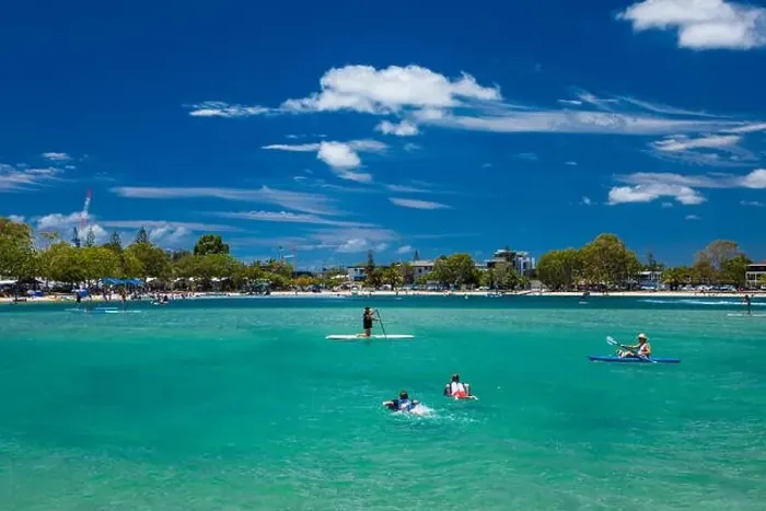 Framed Print : Gold Coast, AUS - JAN 12 2019: People enjoying beach activities at famous family beach at Tallebudgera Creek Gold Coast Framed Print : Gold Coast, AUS - JAN 12 2019: People enjoying beach activities at famous family beach at Tallebudgera Creek Gold Coast