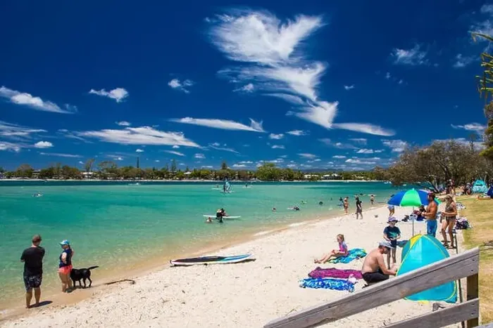 Framed Print : Gold Coast, AUS - JAN 12 2019: People enjoying beach activities at famous family beach at Tallebudgera Creek Gold Coast Framed Print : Gold Coast, AUS - JAN 12 2019: People enjoying beach activities at famous family beach at Tallebudgera Creek Gold Coast