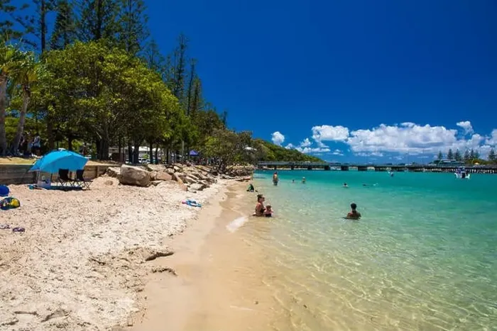Framed Print : Gold Coast, AUS - JAN 12 2019: People enjoying beach activities at famous family beach at Tallebudgera Creek Gold Coast