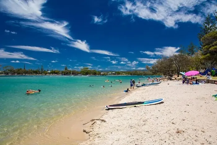 Framed Print : Gold Coast, AUS - JAN 12 2019: People enjoying beach activities at famous family beach at Tallebudgera Creek Gold Coast Framed Print : Gold Coast, AUS - JAN 12 2019: People enjoying beach activities at famous family beach at Tallebudgera Creek Gold Coast