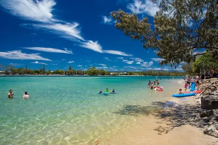 Framed Print : Gold Coast, AUS - JAN 12 2019: People enjoying beach activities at famous family beach at Tallebudgera Creek Gold Coast