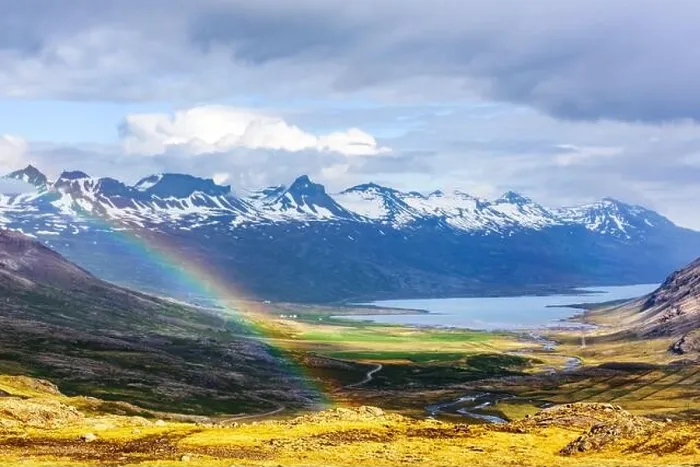 Framed Print : Gorgeous Icelandic landscape with fjord and rainbow on snowy mountains background Framed Print : Gorgeous Icelandic landscape with fjord and rainbow on snowy mountains background