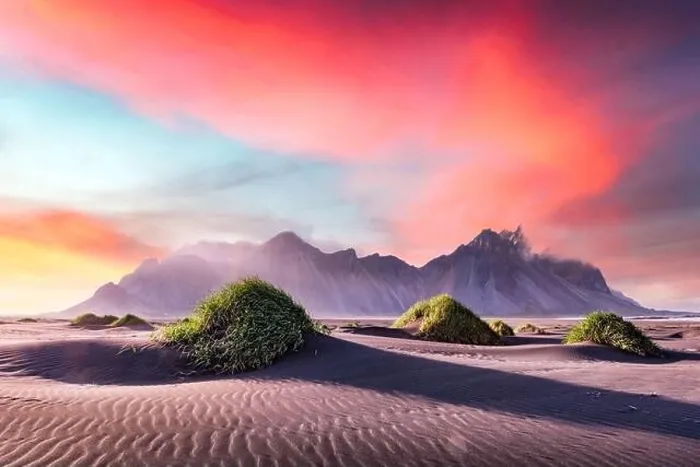 Framed Print : Gorgeous landscape with black sand desert dunes and grassy bumps near famous Stokksnes mountains on Vestrahorn cape, Iceland Framed Print : Gorgeous landscape with black sand desert dunes and grassy bumps near famous Stokksnes mountains on Vestrahorn cape, Iceland