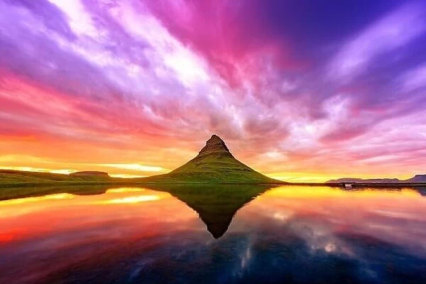 Gorgeous landscape with Kirkjufell mountain and colorful sunset sky on Snaefellsnes peninsula near, Iceland