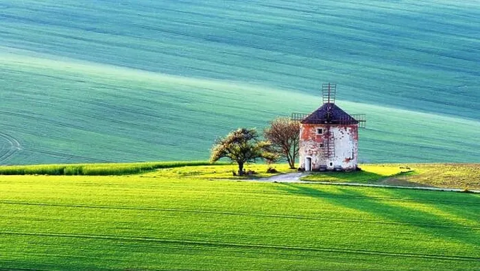 Framed Print : Gorgeous rural landscape with old windmill and green sunny spring hills. South Moravia region, Czech Republic Framed Print : Gorgeous rural landscape with old windmill and green sunny spring hills. South Moravia region, Czech Republic