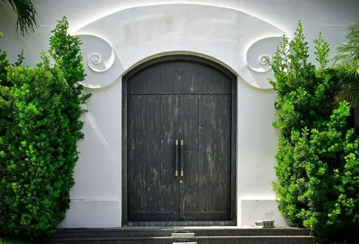 Framed Print : A grand double door entrance to a luxurious property development Framed Print : A grand double door entrance to a luxurious property development