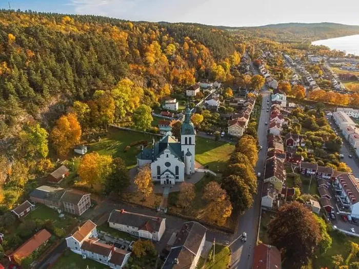 Framed Print : Gränna church in Sweden, autumn colors, at sunset, aerial view. Beautiful small swedish town Framed Print : Gränna church in Sweden, autumn colors, at sunset, aerial view. Beautiful small swedish town
