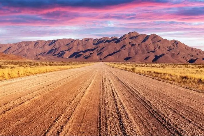 Framed Print : Gravel road and beautiful landscape with sunset sky Framed Print : Gravel road and beautiful landscape with sunset sky