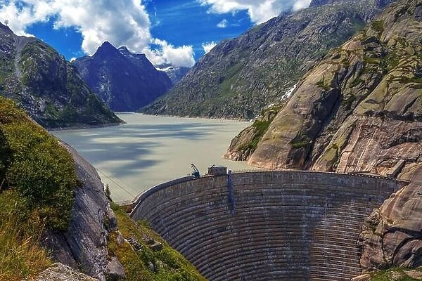 Great view from the top of the Grimsel pass over the Grimselsee dam. Switzerland, Bernese Alps, Europe