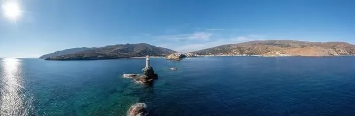 Framed Print : Greece. Andros Island. The stone beacon on a rock aerial panoramic view