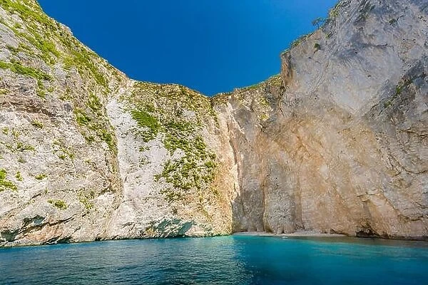 Greece, cliff landscape with sea as travel destination island with blue sky. Idyllic shoreline in Greece, Zakynthos