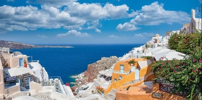 Framed Print : Greek island of Santorini. Amazing travel panorama, white houses, stairs and flowers on the streets. Idyllic summer vacation, urban landscape, Oia Framed Print : Greek island of Santorini. Amazing travel panorama, white houses, stairs and flowers on the streets. Idyllic summer vacation, urban landscape, Oia