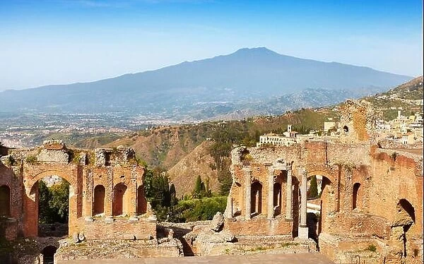 The Greek theatre in Taormina, Mount Etna Volcano in the distance, Sicily, Italy
