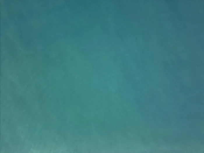 Framed Print : Green tropical sea water with small waves above top drone view Framed Print : Green tropical sea water with small waves above top drone view