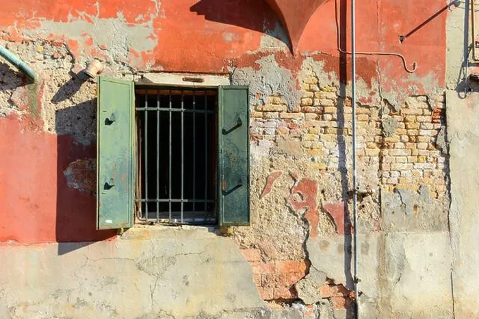 Framed Print : Green window on orange old house wall Cracks in concrete visible red bricks in Venice, Italy Framed Print : Green window on orange old house wall Cracks in concrete visible red bricks in Venice, Italy