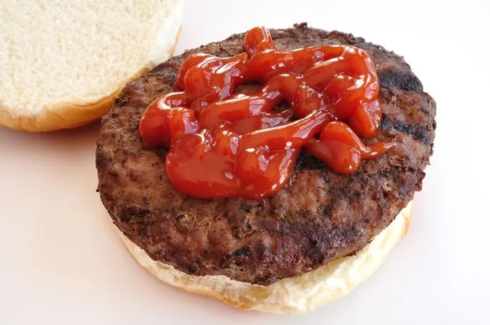 Framed Print : Grilled Hamburger with tomato sauce / Catsup / Ketchup on a bun / bap Framed Print : Grilled Hamburger with tomato sauce / Catsup / Ketchup on a bun / bap