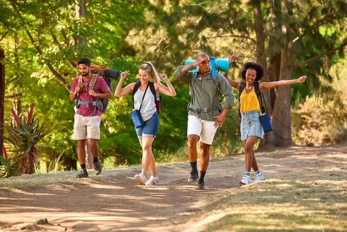 Framed Print : Group Of Friends With Backpacks On Vacation Hiking Through Forest Countryside Together Framed Print : Group Of Friends With Backpacks On Vacation Hiking Through Forest Countryside Together