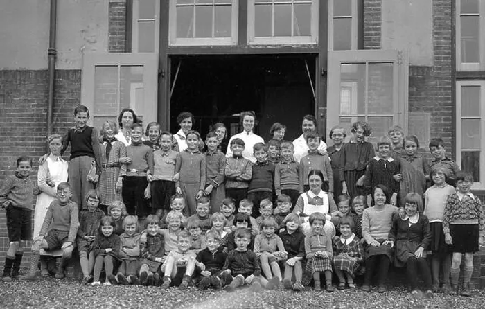 Framed Print : Group portrait of the children and staff of the Restlingsoord Train 8.28 H.IJ.S.M. (Colonieweg) in Soest, with director Sister Edel in the middle row Framed Print : Group portrait of the children and staff of the Restlingsoord Train 8.28 H.IJ.S.M. (Colonieweg) in Soest, with director Sister Edel in the middle row