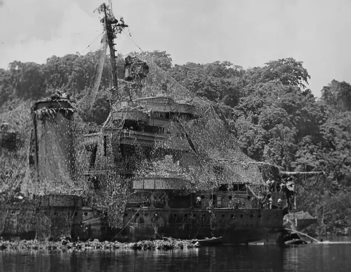 Framed Print : GUADALCANAL, SOLOMON ISLANDS - 1943 - The USS NEW ORLEANS heavily camouflaged with netting during the Battle of Framed Print : GUADALCANAL, SOLOMON ISLANDS - 1943 - The USS NEW ORLEANS heavily camouflaged with netting during the Battle of