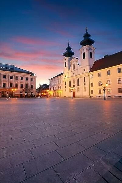 Gyor, Hungary. Cityscape image of downtown Gyor, Hungary with Szechenyi Square at sunrise