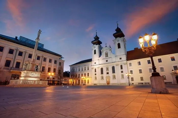 Framed Print : Gyor, Hungary. Cityscape image of downtown Gyor, Hungary with Szechenyi Square at sunrise Framed Print : Gyor, Hungary. Cityscape image of downtown Gyor, Hungary with Szechenyi Square at sunrise