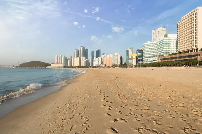 Framed Print : Haeundae beach is Busan's most popular beach because of its easy access from downtown Busan. And It is one of the most famous beaches in South Korea Framed Print : Haeundae beach is Busan's most popular beach because of its easy access from downtown Busan. And It is one of the most famous beaches in South Korea