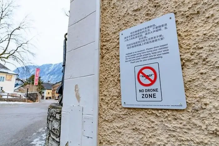 Framed Print : hallstatt, austria, 08 jan 2021, sign forbigging drone flights in the old town