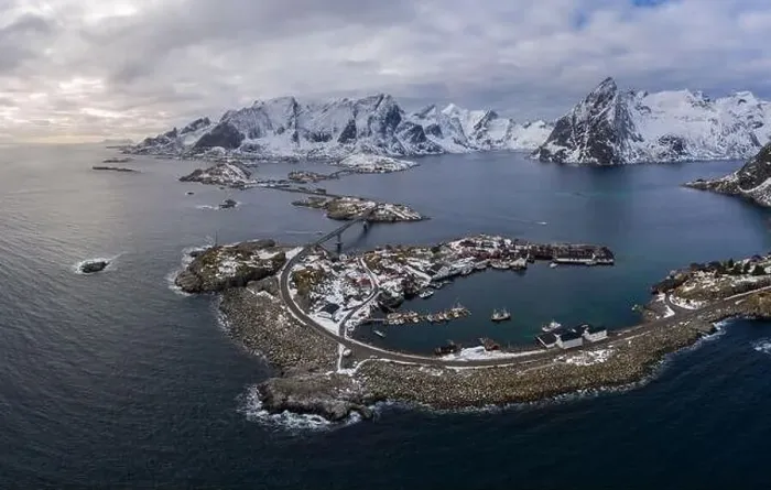 Framed Print : Hamnoy Village and Mountains in Winter. Norwegian Sea and Stormy Sky. Moskenes, Lofoten Islands, Norway. Aerial View Framed Print : Hamnoy Village and Mountains in Winter. Norwegian Sea and Stormy Sky. Moskenes, Lofoten Islands, Norway. Aerial View