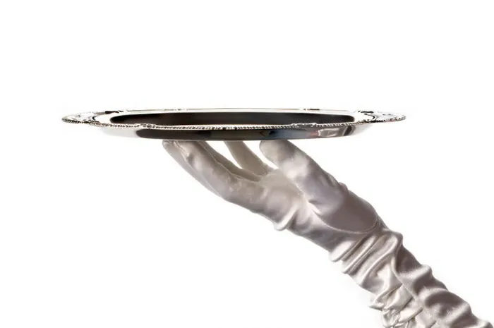 Framed Print : hand holding silver tray Framed Print : hand holding silver tray