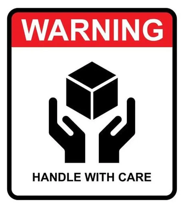 Framed Print : Handle with care flat icon with warning label isolated on white background
