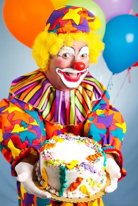 Framed Print : Happy birthday clown holding a birthday cake. Cake is ready for your text Framed Print : Happy birthday clown holding a birthday cake. Cake is ready for your text