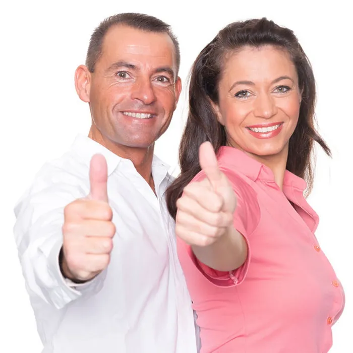 Framed Print : Happy couple in front of white background with thumbs up