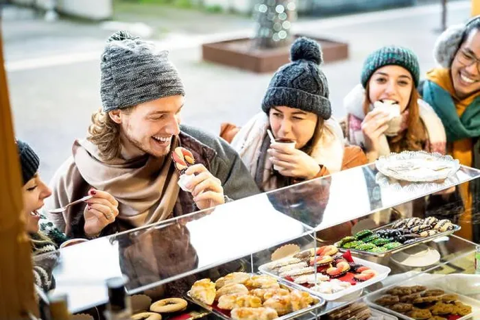Framed Print : Happy friends having fun eating at Christmas market on winter time - Urban holiday concept with young people hanging Framed Print : Happy friends having fun eating at Christmas market on winter time - Urban holiday concept with young people hanging