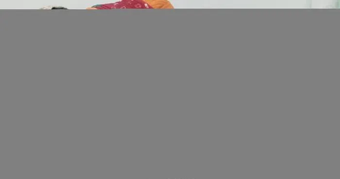 Framed Print : Happy Indian couple in traditional attire is taking a selfie using a smartphone Framed Print : Happy Indian couple in traditional attire is taking a selfie using a smartphone